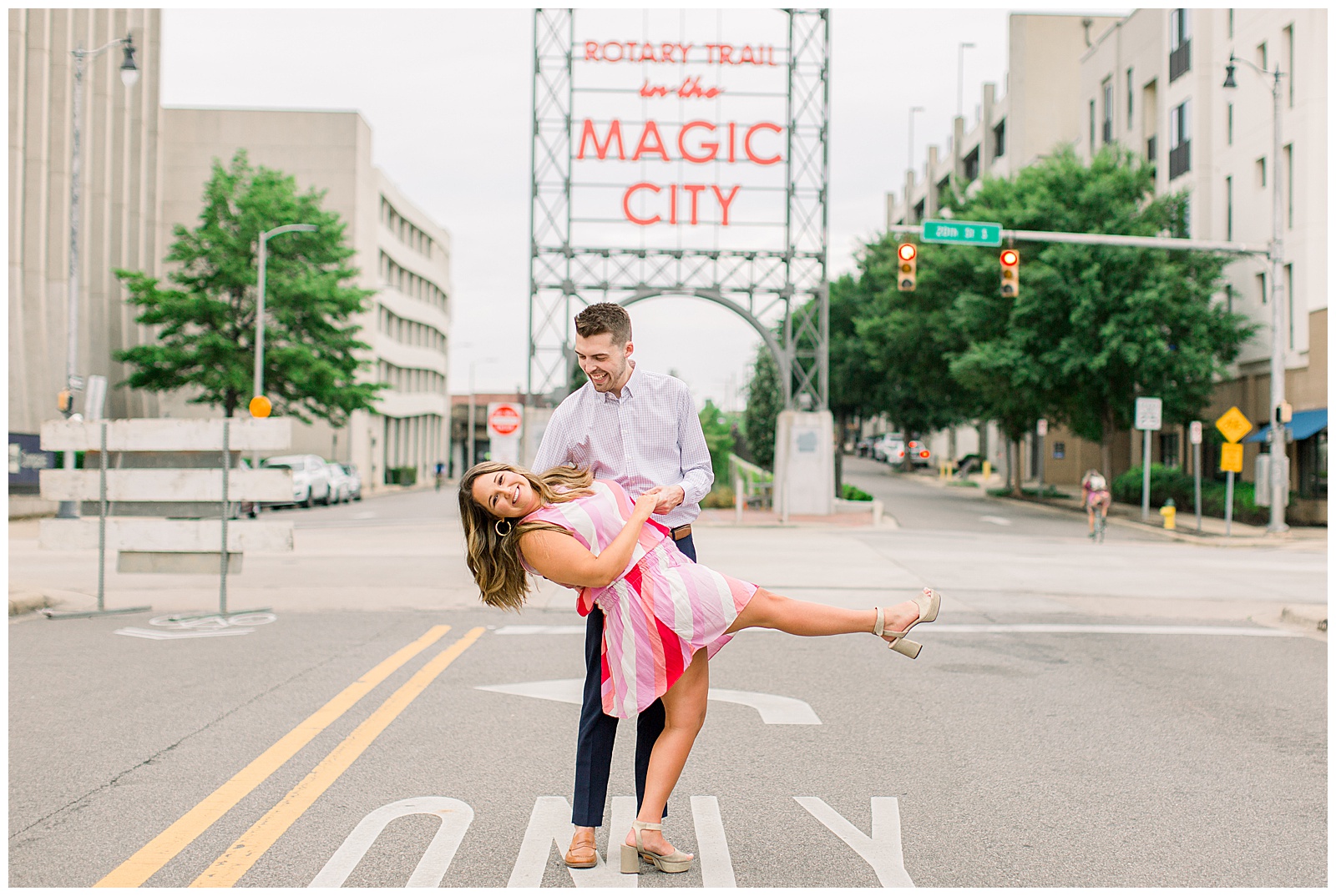 Couple in front of Magic City Sign 